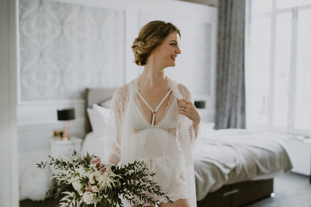 Romantic Bridal Preparation With Bridal Lingerie and Lace Garter